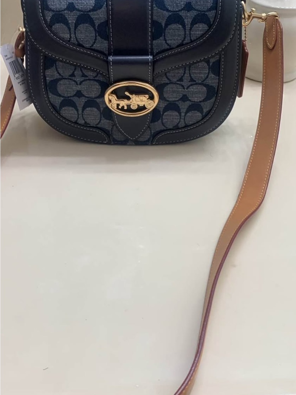 Coach Navy Signature Canvas Saddle Crossbody with Tan Strap and Gold Hardware